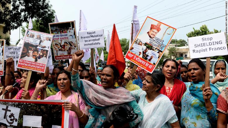 Indian women hold placards and chant slogans during a September protest march to demand the immediate arrest of Roman Catholic church Bishop Franco Mulakkal, who is accused of raping a nun.
